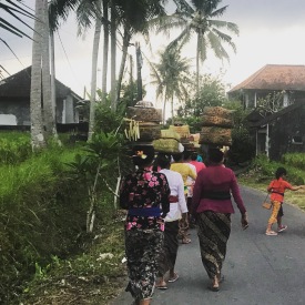 Women of the village are walking to their gathering